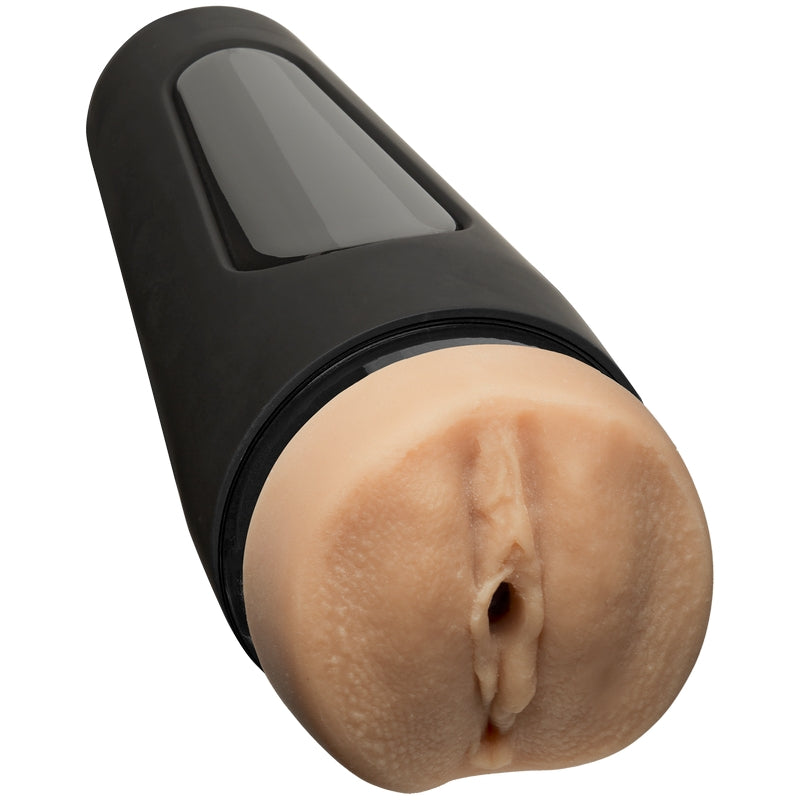 Beige masturbator with a vaginal opening and a hard black shell 