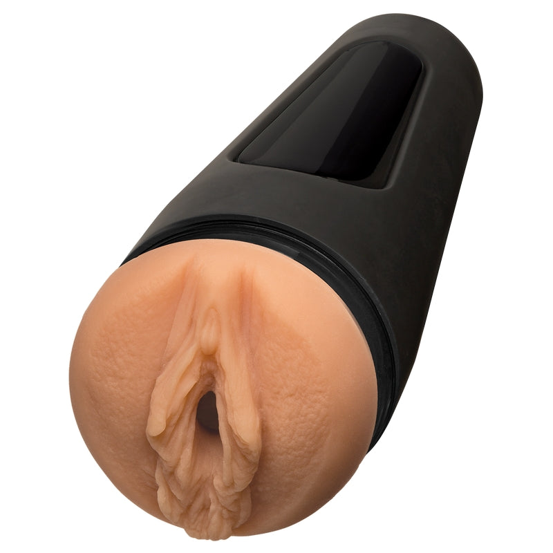Image shows the vaginal opening of the beige masturbator with a black hard shell 