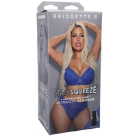 grey packaging with a busty Bridgette B posing in a blue bra and panties 