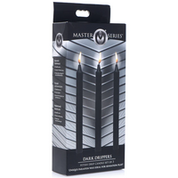Dark drippers 3pk drip candles inside packaging.