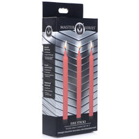 Red 3pk fire stick drip candles inside packaging.