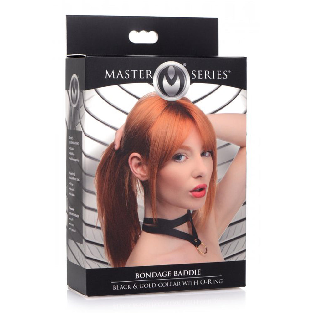 Black & gold bondage baddie collar with o-ring inside packaging.