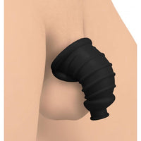 Black silicone chastity chamber example photo.