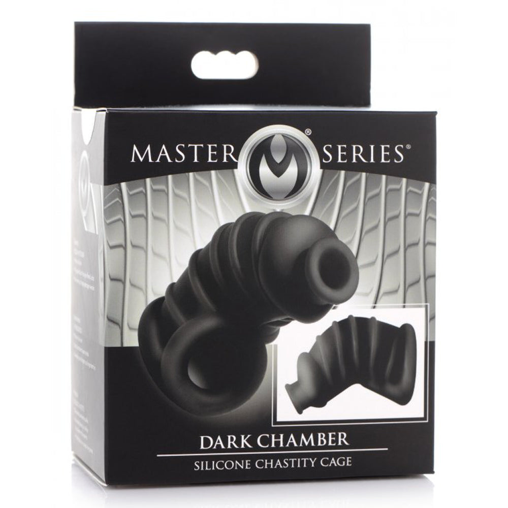 Dark chamber black silicone chastity cage inside packaging.