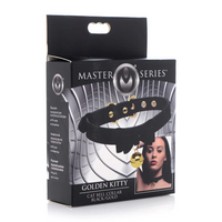 Black & gold kitty cat bell collar inside packaging.