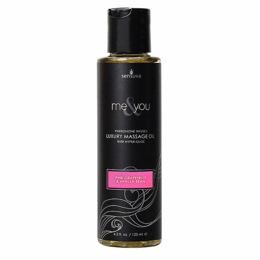 Pink grapefruit & vanilla bean massage oil featuring 125ml bottle.