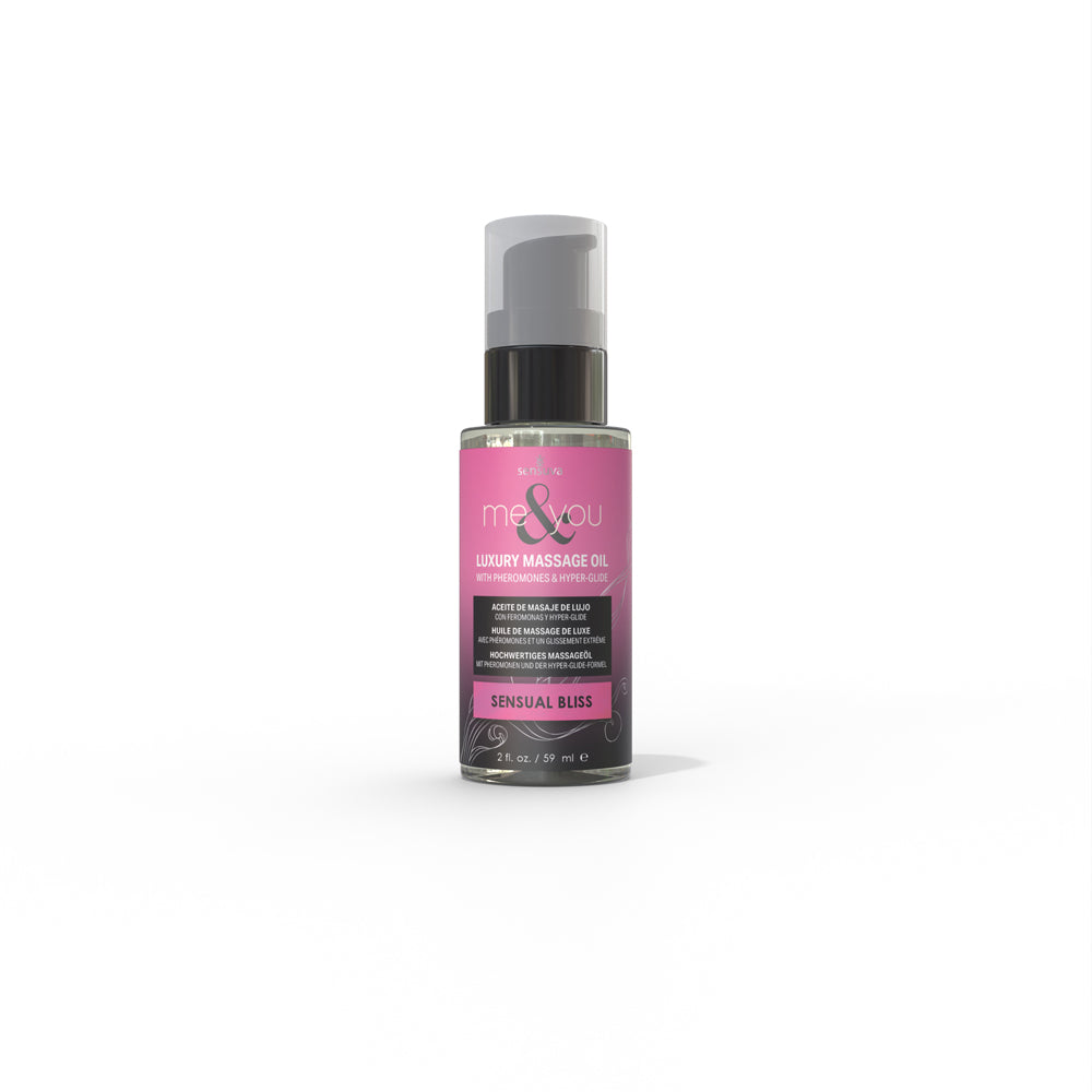 Pink grapefruit & vanilla bean massage oil 59ml featuring squeeze top bottle.