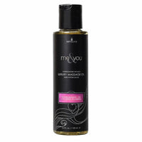 Pomegranate fig coconut & plumeria luxury massage oil featuring a 125ml bottle.