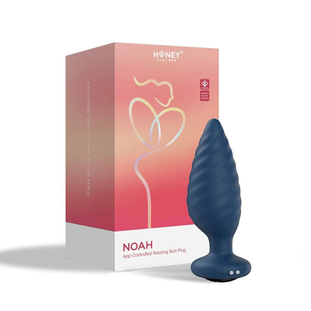 Blue app controlled rotating butt plug beside box