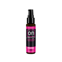 On arousal gel bottle with pump top on white background.