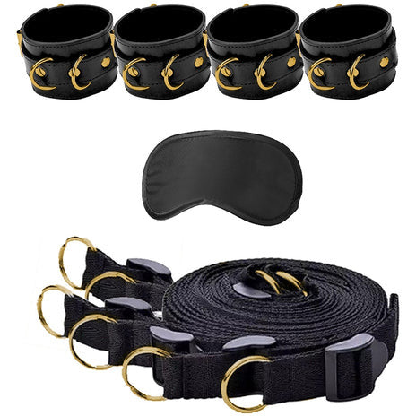 wrist and ankle cuffs, an eye mask and a restraint system 