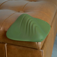 Green vibrating pleasure pad example photo. Featuring 10 vibration settings and waterproof design example photo.