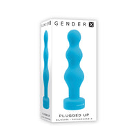 Blue vibrating anal plug inside packaging.
