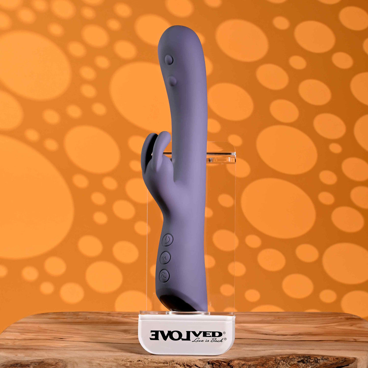 Purple tapping vibrator against display case example photo.