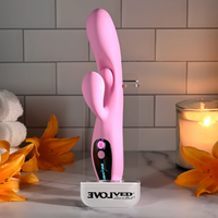 Pink push the button vibrator on display example photo.