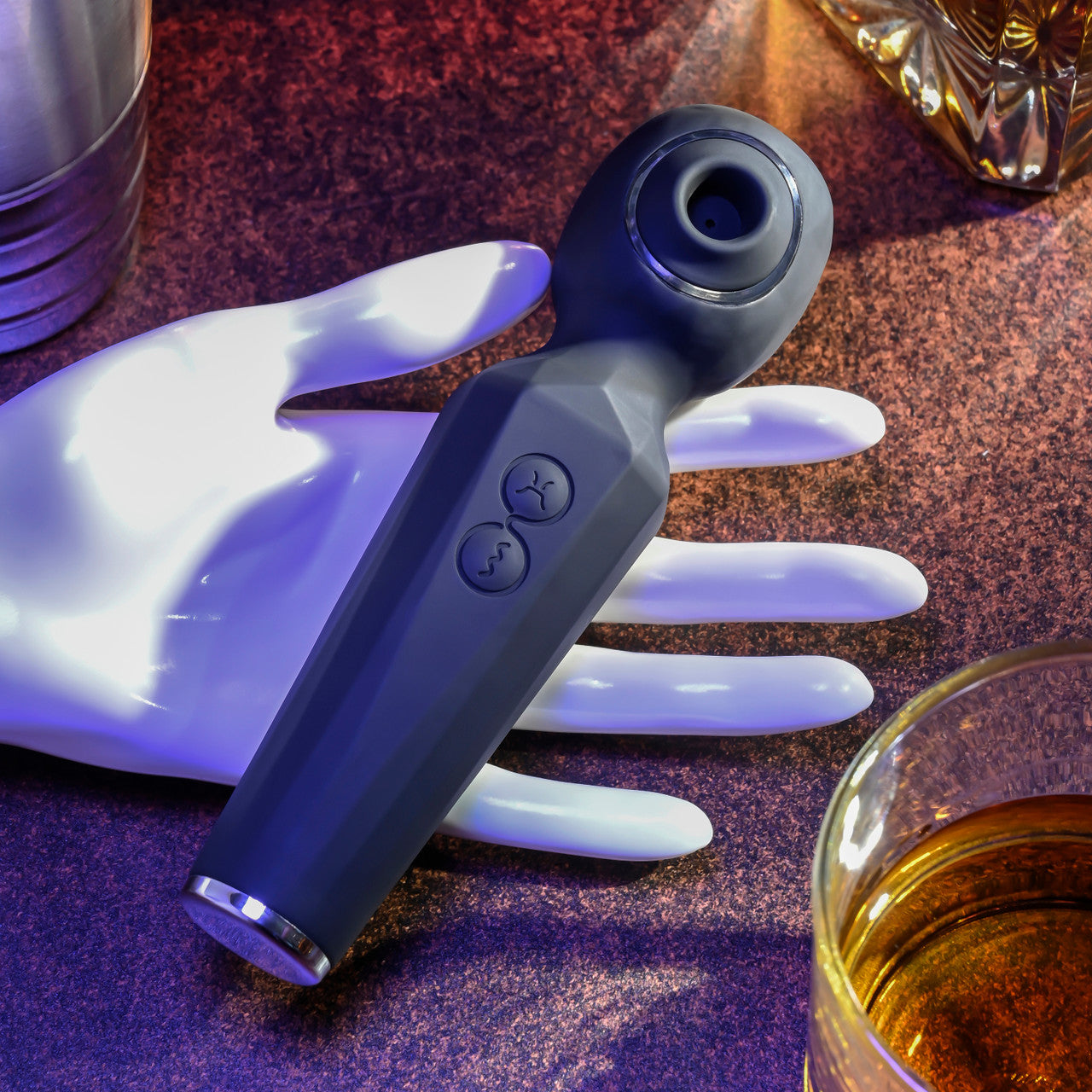 Black rainbow sucker vibrator example photo with buttons displayed.