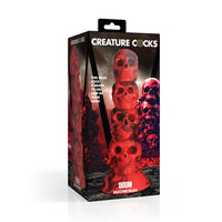 Red doom silicone dildo inside packaging.