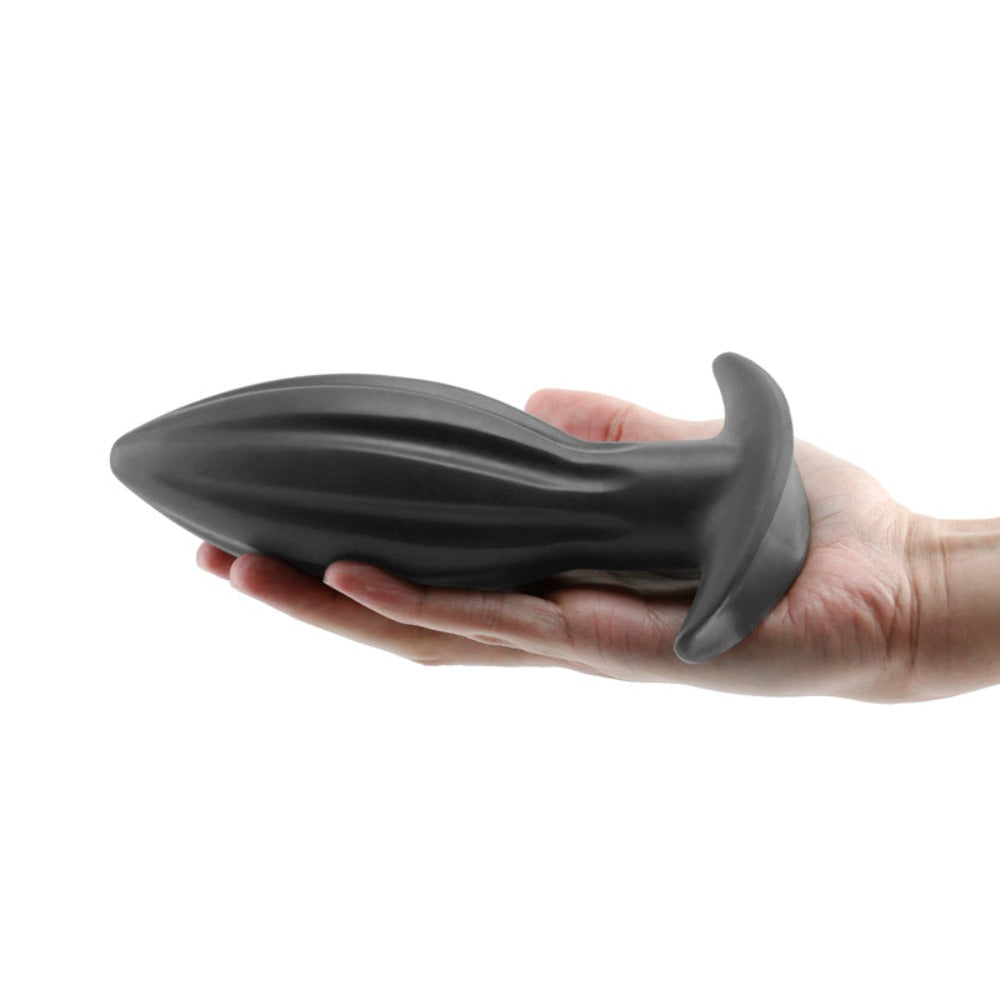 Large black silicone anal plug example photo.