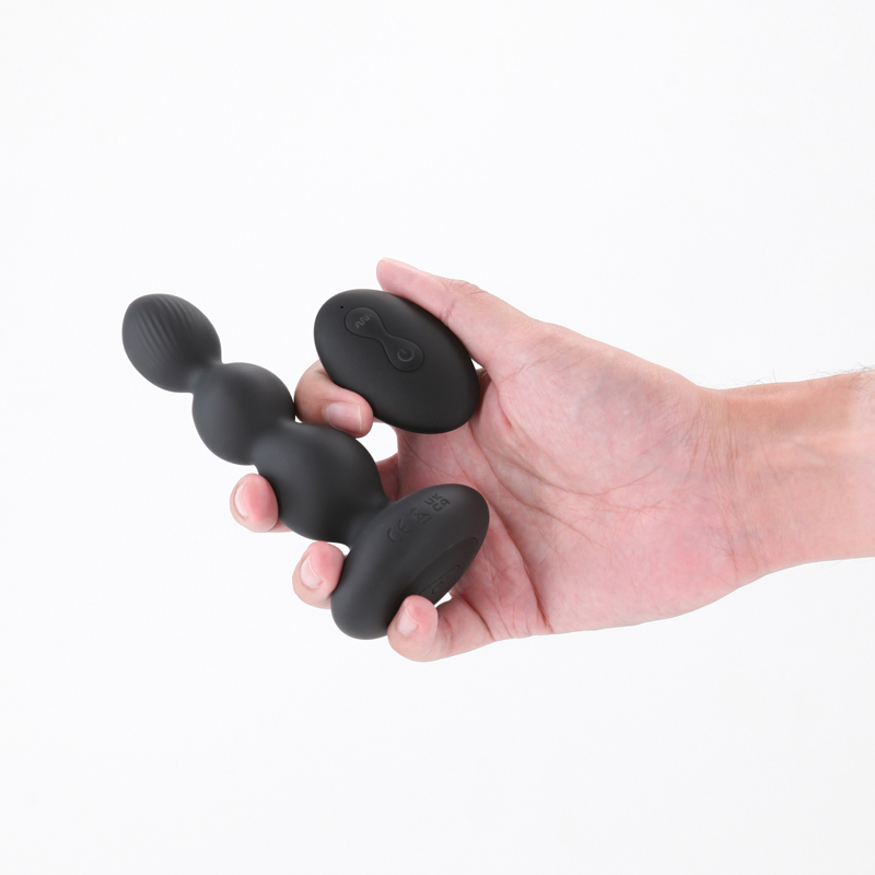 Valor black vibrating anal plug inside packaging.