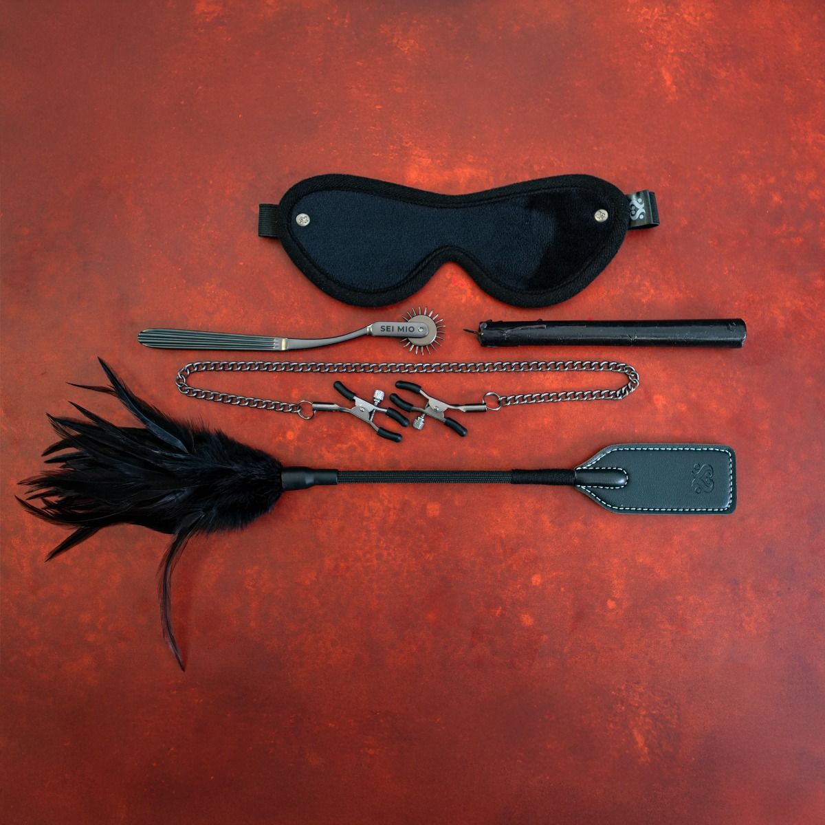 Black 5pc fetish feels toolkit example photo.