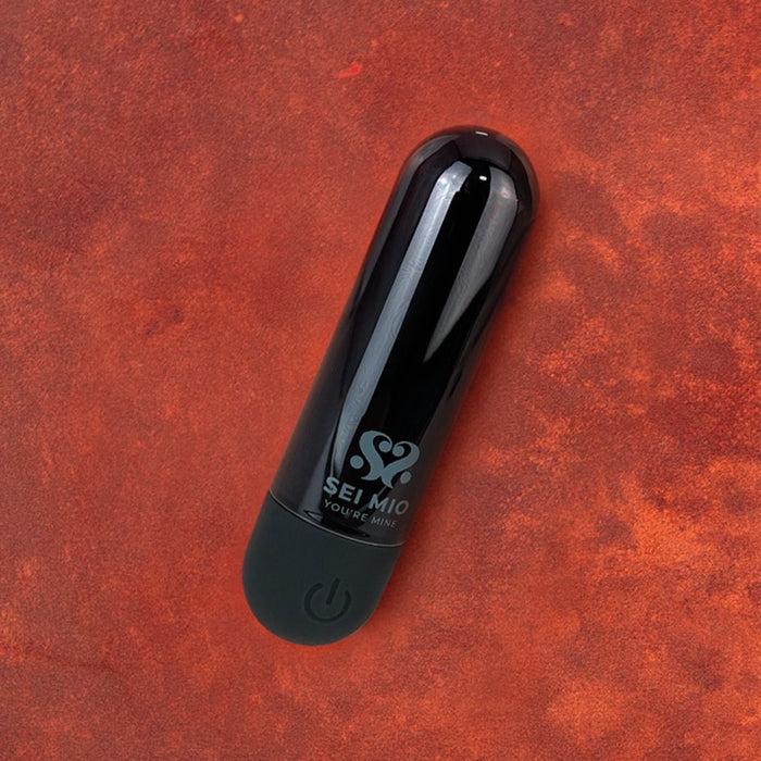 Black bullet vibrating massager example photo.