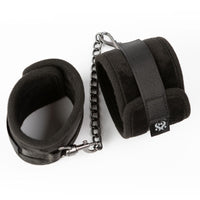 Black padded ankle restraints example photo.