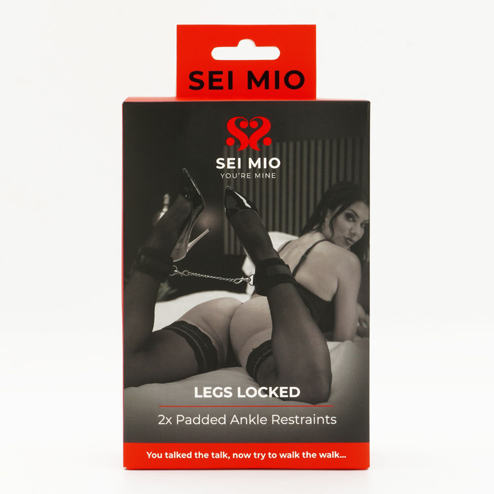 Padded ankle restraints inside packaging.