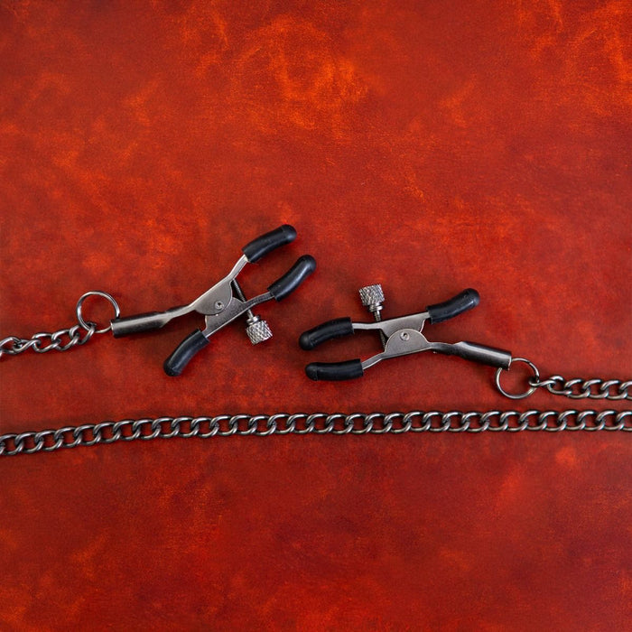 Nip and tug clamps with chain example photo.