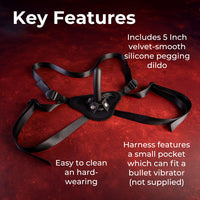 Strap on harness with dildo featuring 5 inch silicone pegging dildo, harness with a small pocket.