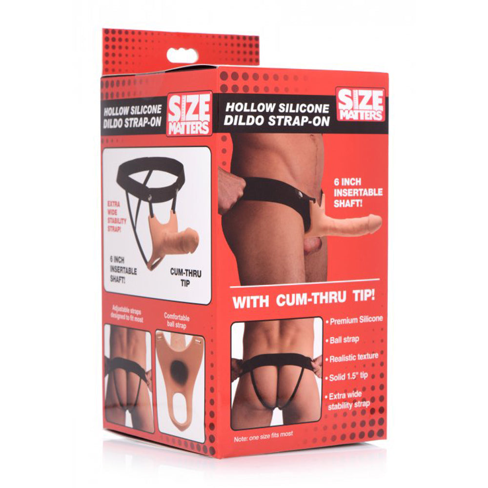 Hollow silicone dildo strap on inside packaging.