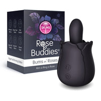 Black Skins bums n roses vibrating rimming toy beside packaging.