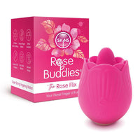 Pink rose buddies the rose fix vibrating clitoral toy beside packaging.