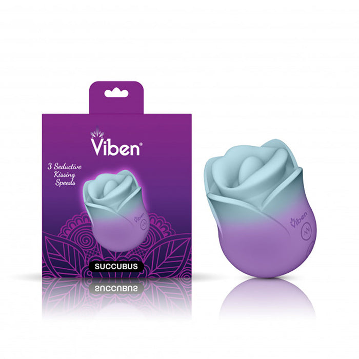 Multi colored vibrating kissing rose beside packaging.