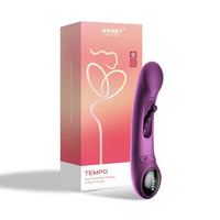 Purple app controlled tapping g-spot vibrator beside box