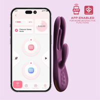 Purple G flicking rabbit vibrator beside smart phone