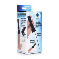 Black head teaser with urethral insert inside packaging.