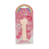 Pink Unihorn heart throb clitoral vibrator inside packaging.