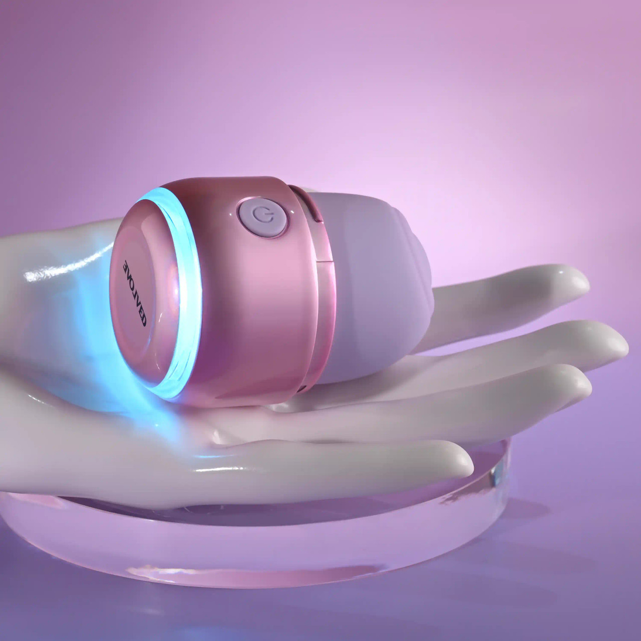 Pink tapping vibrator with colorful lights example photo.