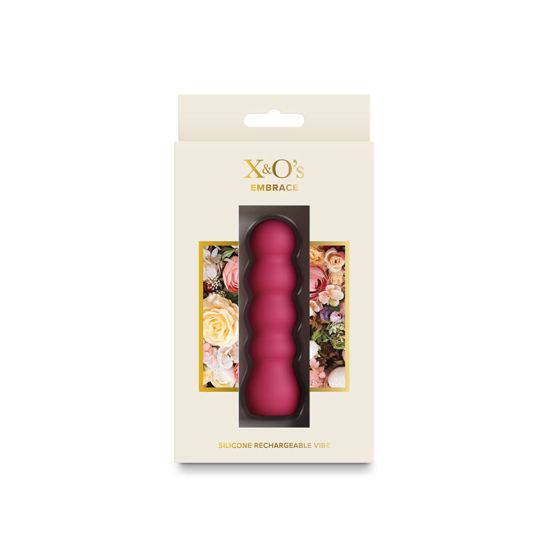Pink X & O's embrace vibrator inside packaging.