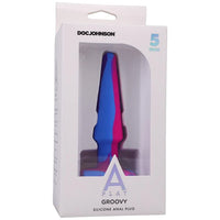 5" purple, blue and pink tapered anal plug inside a white box