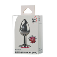 silver metal anal plug with pink gem on bottom on box packaging