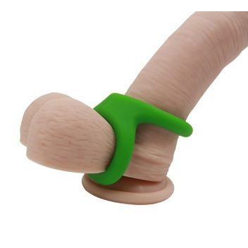 dildo showing how to wear the double cock ring on white back ground