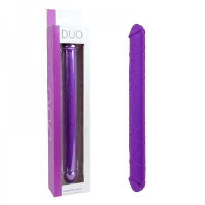 Purple DUO double dildo with packaging on a white background