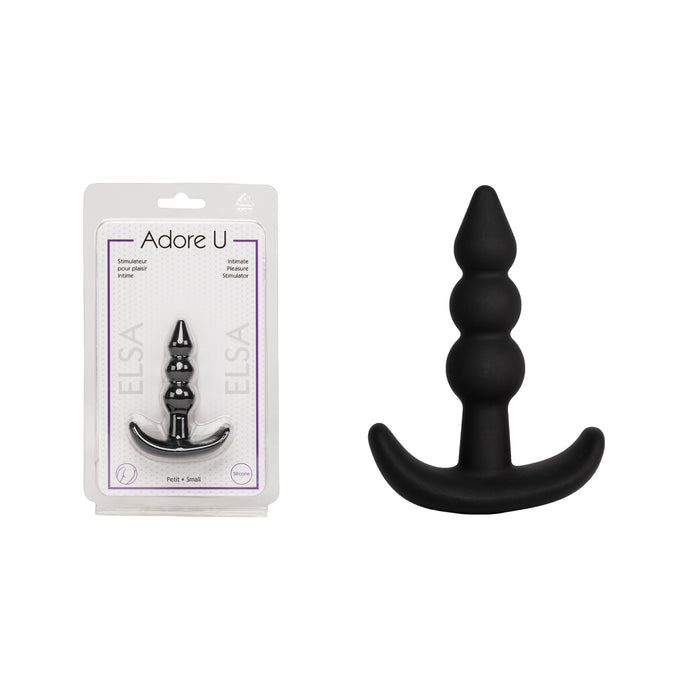 black anal plug with beads beside packaging