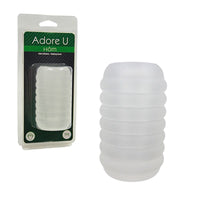 A translucent white silicone sleeve shown next to its retail packaging. The packaging features a green and white card labeled 'Adore U Hóm' with a clear window displaying the bulb inside.
