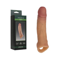 realistic penis sleeve beside box packaging