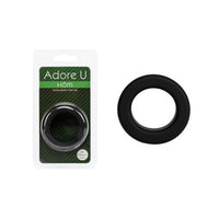 black silicone cock ring beside packaging