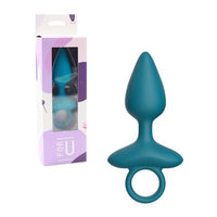 Teal silicone butt plug with packaging on a white background