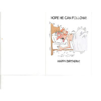 Cartoon of a man & woman in bed, captioned 'Hope he can follow! Happy Birthday!'.