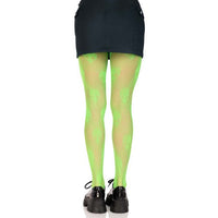 Person wearing green patterned alien tights on a white background
